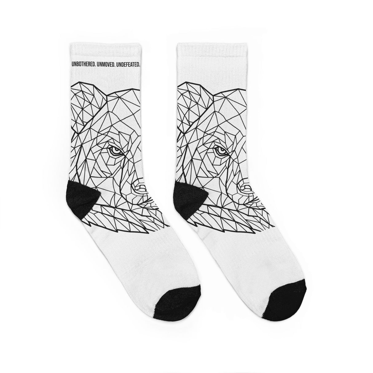 All-over print of Bear Crew Socks featuring geometric animal design with the phrase "Unbothered. Unmoved. Undefeated." by Printify.
