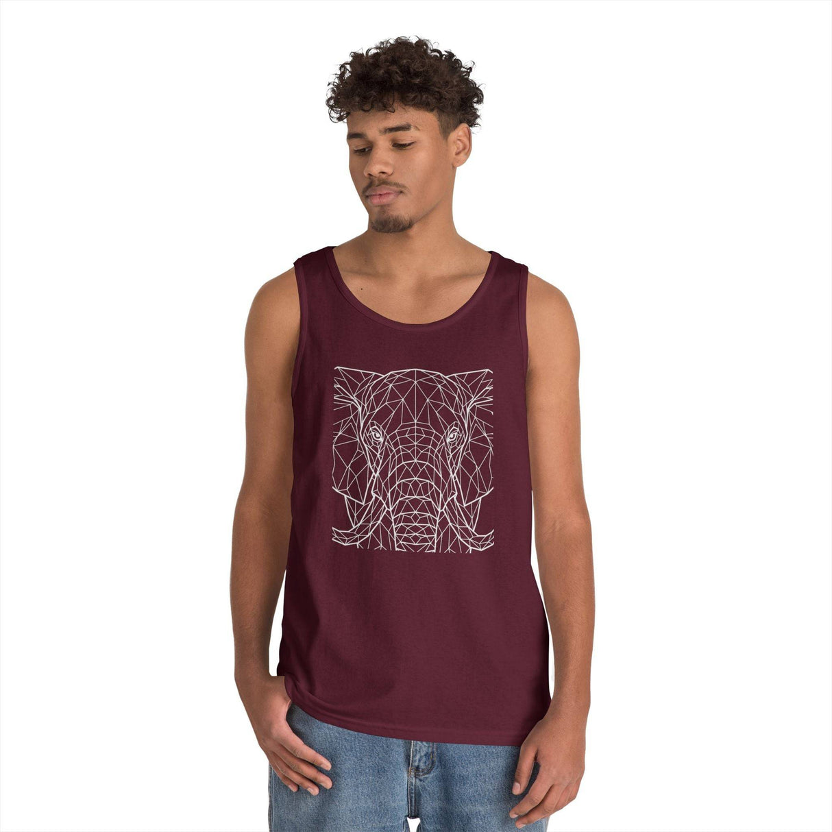 Young man wearing a maroon tank top featuring a minimalist geometric elephant design in white lines, paired with casual blue jeans on a plain white background. | PicSEO 1776569530881