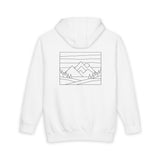 White hoodie with a black line art design of mountains on the back against a white background