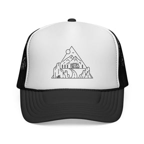 Road Trip Trucker Hat from the Nature Series with "Nowhere to Be. Everywhere to Go." slogan, featuring mesh panels and adjustable strap.