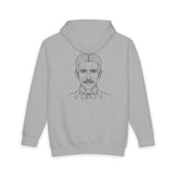 N. Tesla hoodie from the Visionaries Series featuring quote about energy, frequency, and vibration in black and white print.