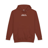 Gray Road Trip Hoodie from the Nature Series featuring the phrase "Nowhere to Be. Everywhere to Go." by Printify.