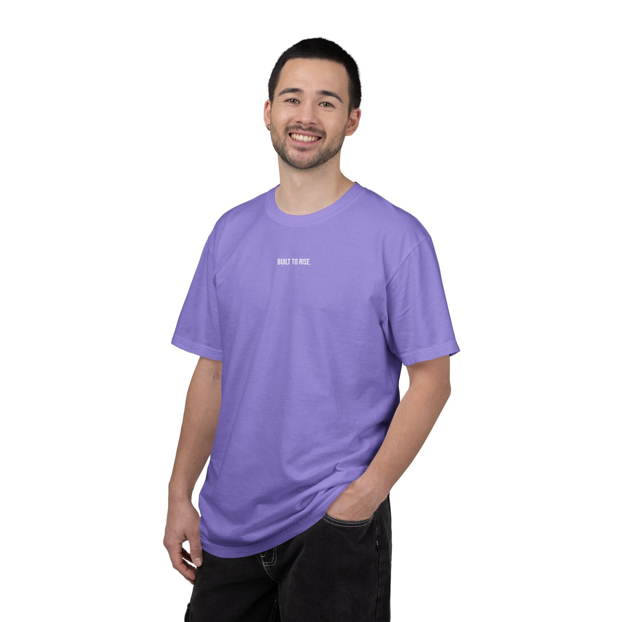 Printify Peak Tee T-shirt from the Nature Series featuring the "Built to Rise" slogan, in a casual style with a natural backdrop.