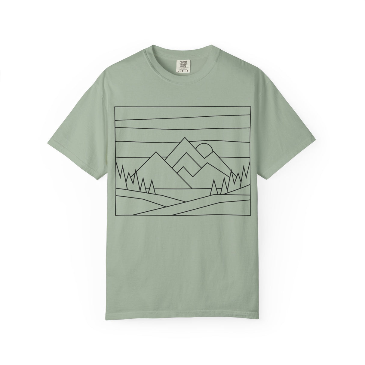 Printify Mountain Tee t-shirt featuring nature-inspired design with the phrase "Built by Nature. Shaped by Choice." on a natural-themed background.