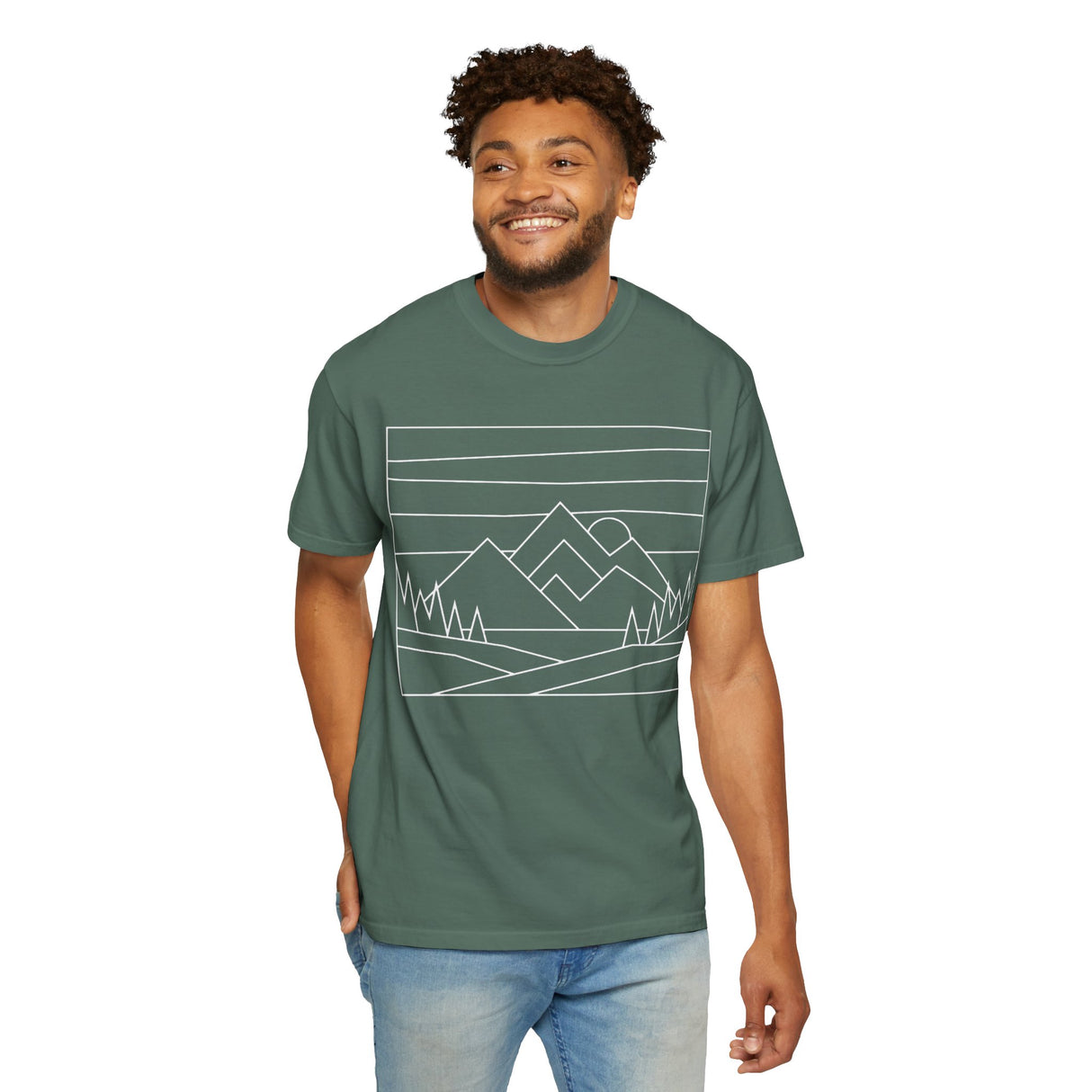 Man wearing a green t-shirt with mountain design on a white background