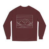Printify Mountain Sweatshirt from the Nature Series with "Built by Nature. Shaped by Choice." printed on the front, shown on a model.