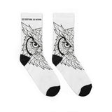 White socks with black owl design and text on a white background