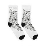 White socks with black geometric wolf design on a white background
