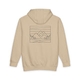 Beige hoodie with a mountain landscape design on the back against a white background