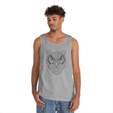 A young man wearing a light gray tank top featuring a detailed geometric owl design on the front, paired with casual blue denim shorts, standing against a plain white background. | PicSEO 1776476425058