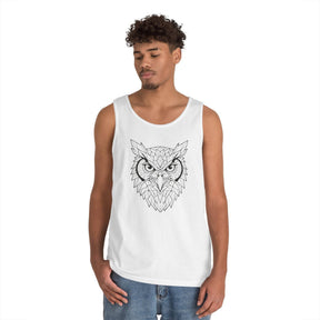 Young man wearing a white sleeveless tank top featuring a detailed geometric owl design in black lines, paired with blue denim jeans against a plain white background. 